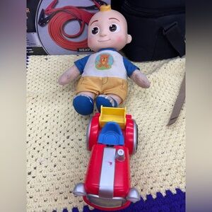 Colorful Plush Doll with Red Tractor—works